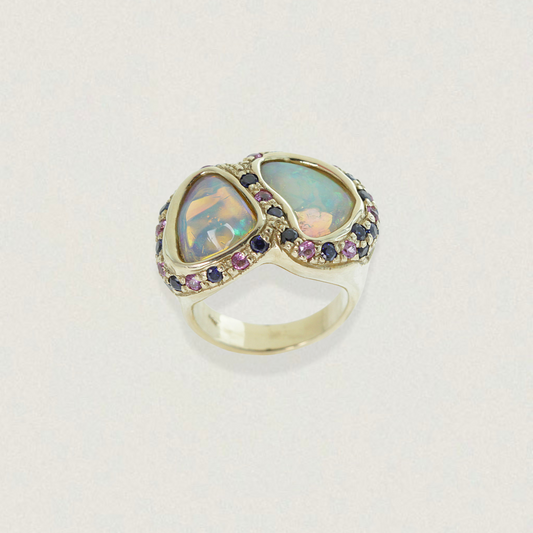 Front view of a 1.21ct Lightning Ridge double opal and sapphire cluster ring in 14ct yellow gold.