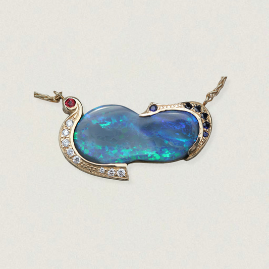 13.40ct Lightning Ridge opal necklace in 14ct yellow gold with sapphire and diamond accents, abstract bezel setting on fine chain.