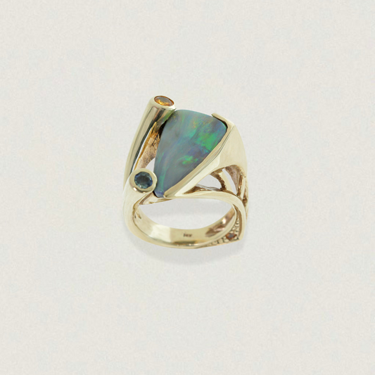 Unisex 4.77ct Lightning Ridge opal ring in 14ct yellow gold with blue and orange sapphires, sculptural split-shank.
