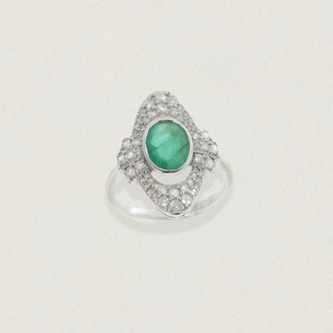 Art Deco engagement ring with 1.26ct oval emerald cabochon and diamond halo in 18ct white gold, product on light background.