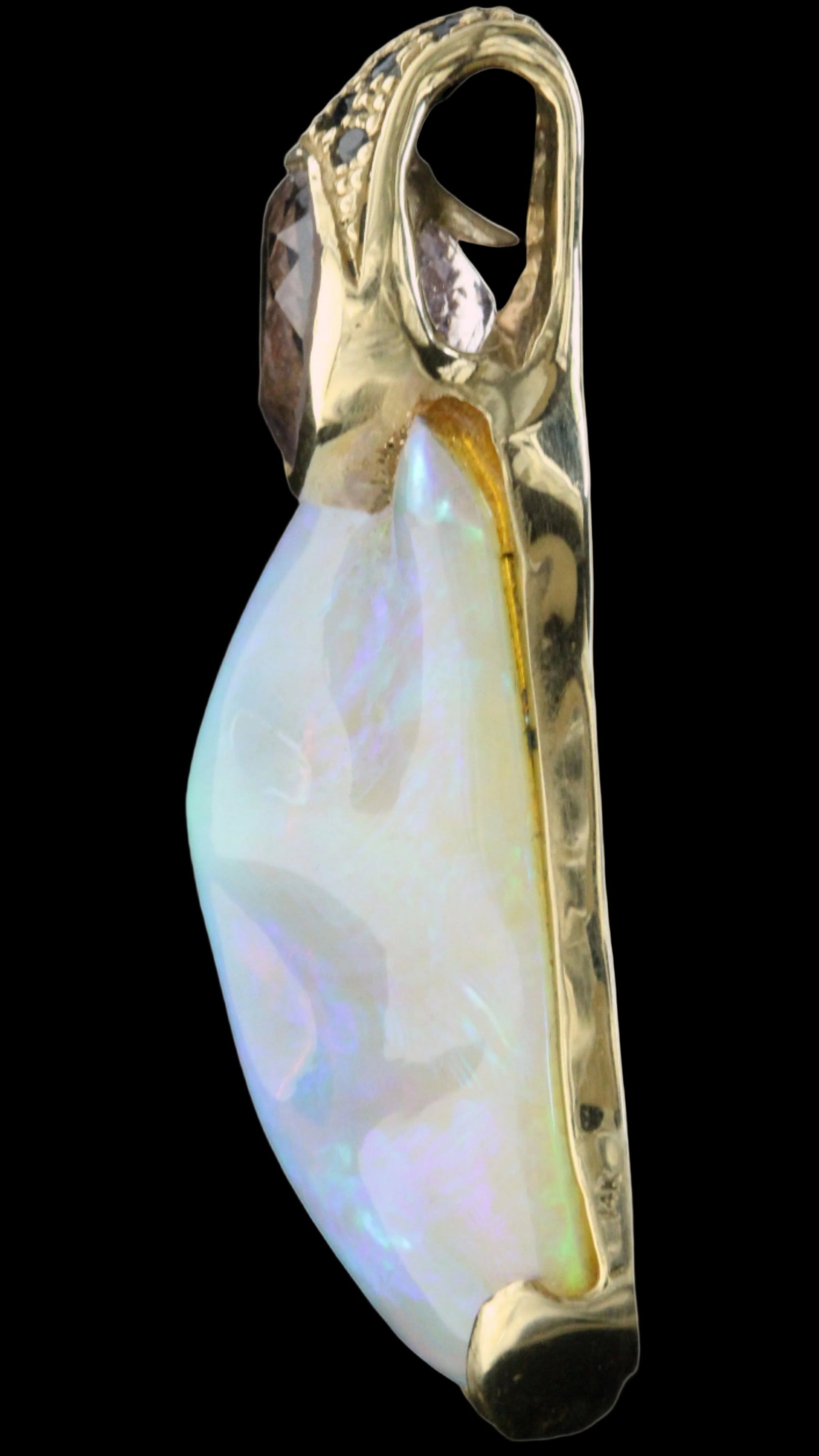 Side profile of 50ct Lightning Ridge crystal opal pendant in yellow gold, showing bezel height and amethyst cap.