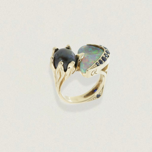 2.54ct Lightning Ridge opal and Tahitian South Sea pearl ring with sapphire accents in 14ct yellow gold, three-quarter studio view