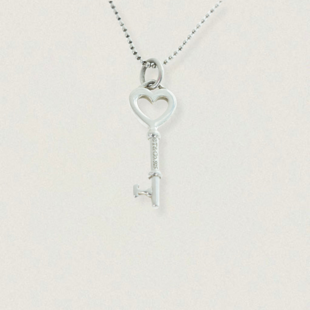 Tiffany & Co. sterling silver heart key charm on bead chain, front view