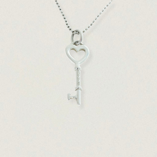 Tiffany & Co. sterling silver heart key charm on bead chain, front view
