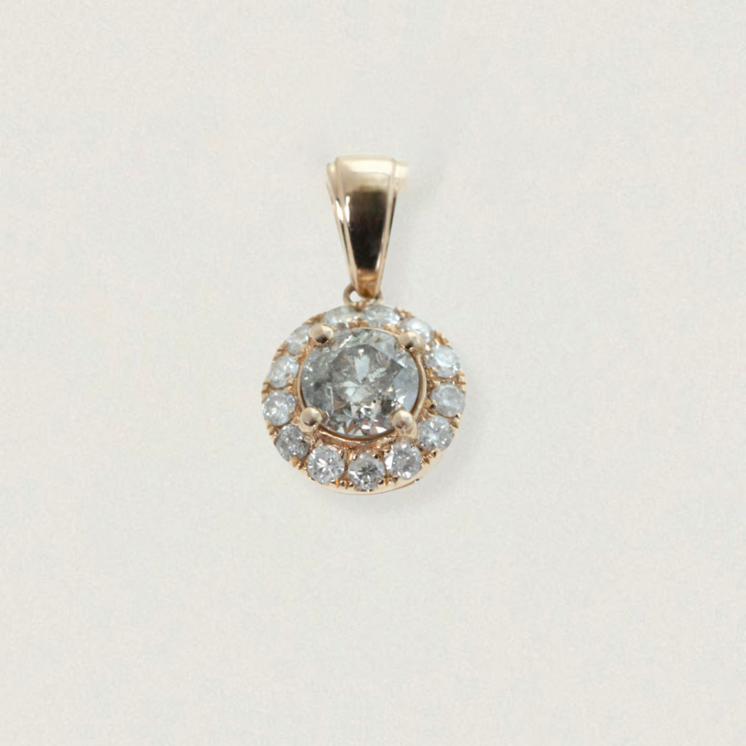 1ct vintage diamond halo pendant in 14ct rose gold on light background