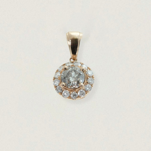 1ct vintage diamond halo pendant in 14ct rose gold on light background